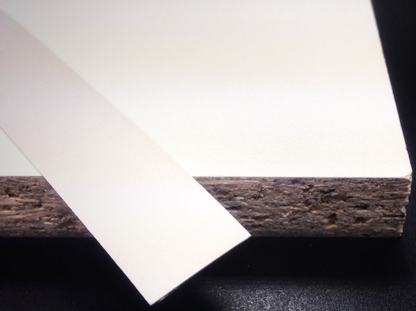 Кромочная лента ПВХ 0,4*19 мм PV2104-911 с плитой ЛДСП 16 мм серый шагрень.