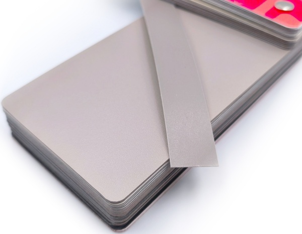 Кромочная лента ПВХ 0,4*19 мм BR988 с плитой ЛДСП 16 мм кубанит серый.