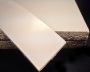 Кромочная лента ПВХ 1*25 мм BR962 с плитой ЛДСП 22 мм серый шелк.